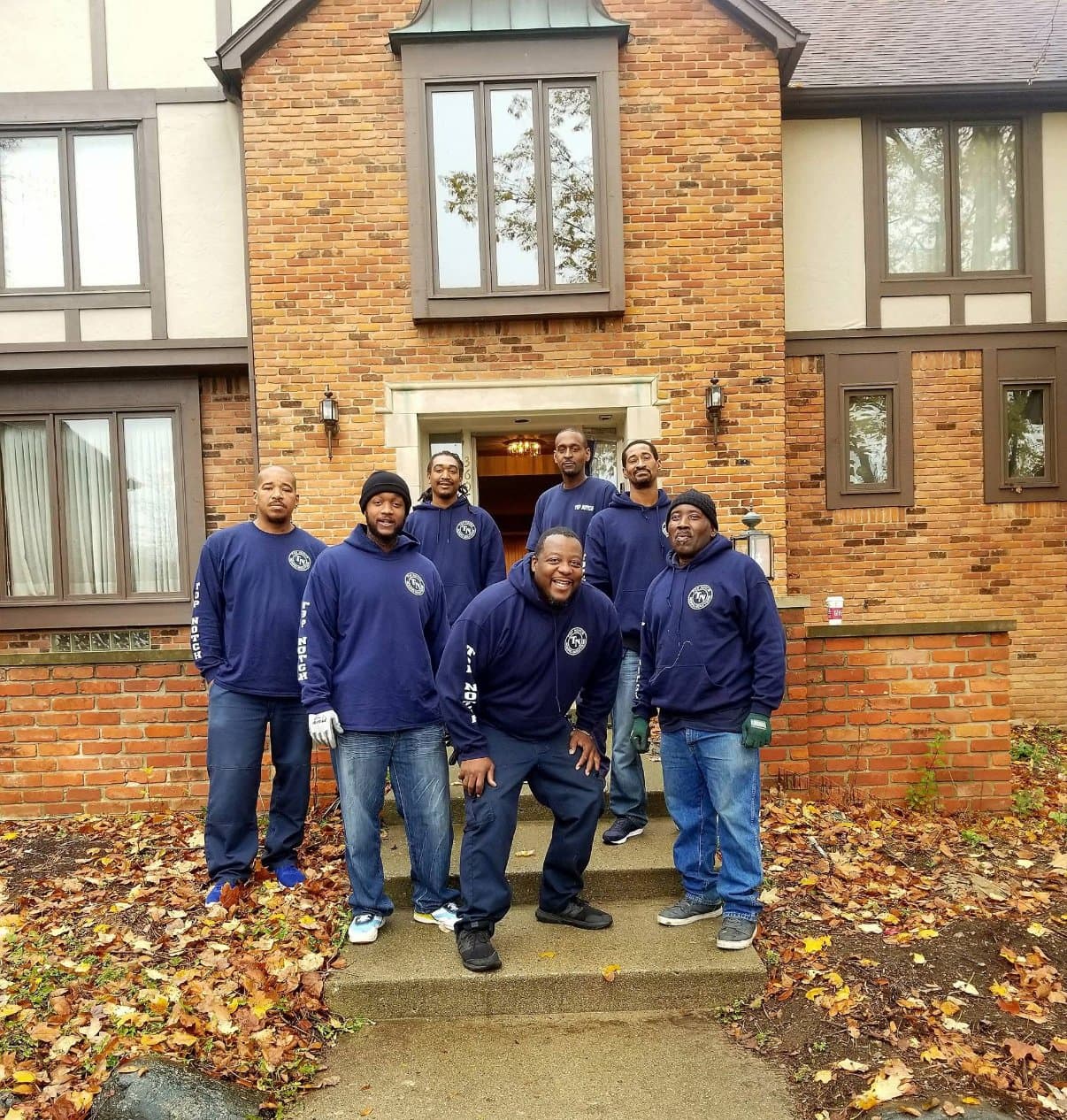 The Top Notch moving crew at a Metro Detroit Tudor home